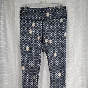 Fabletics Women's Size Small Salar Leggings Black and Gold Star Burst